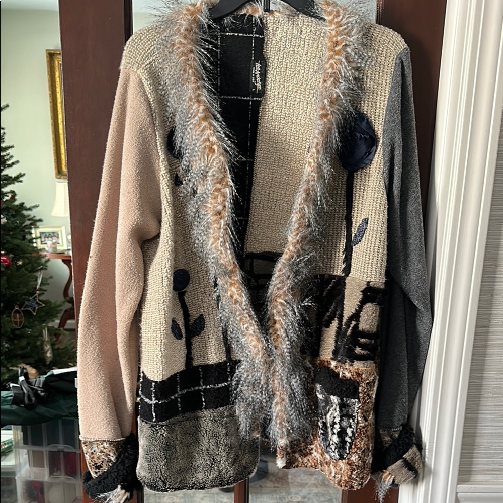 Lee Anderson Boutique sweater, very unique and warm for going out in the winter.